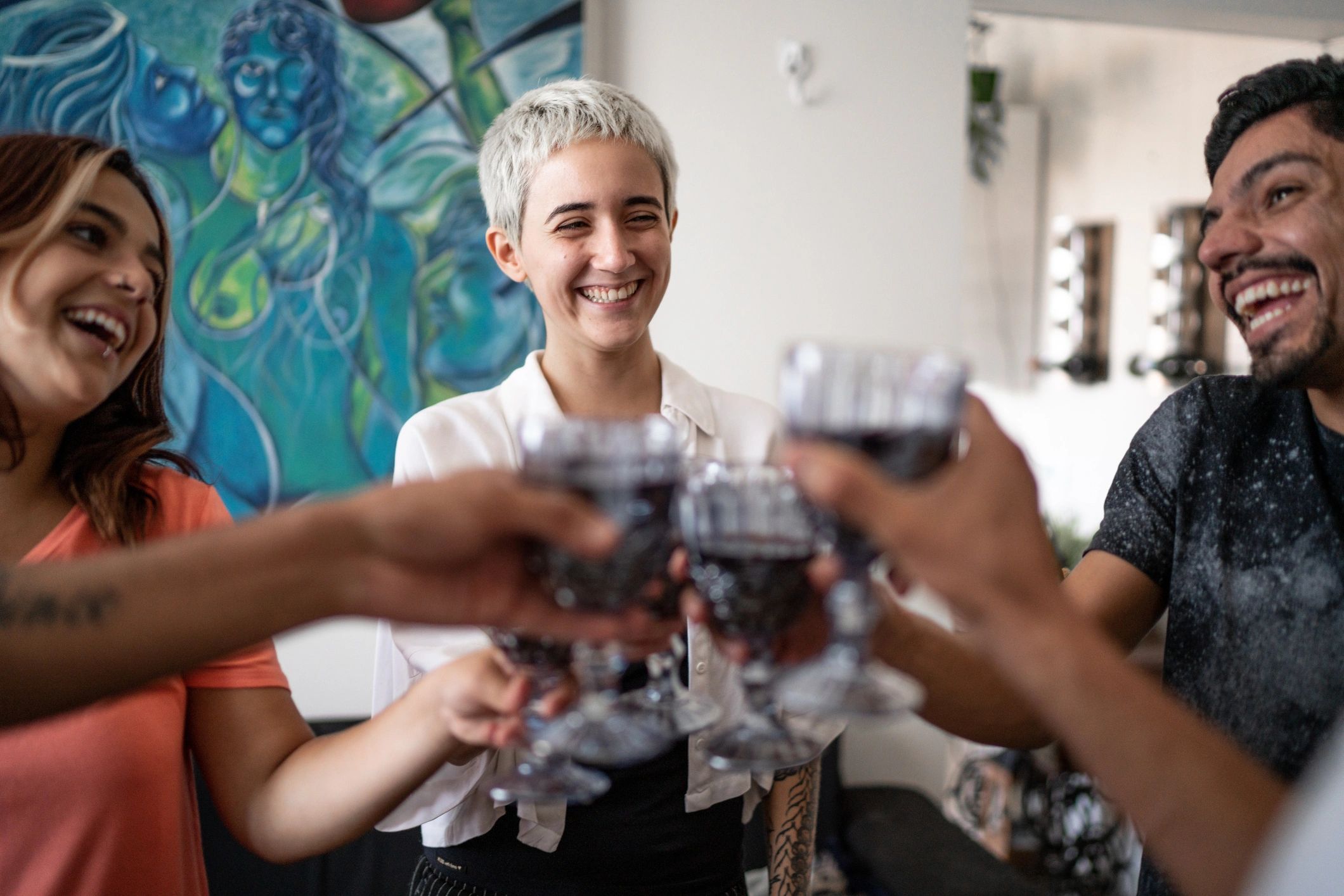 Friends toasting wine